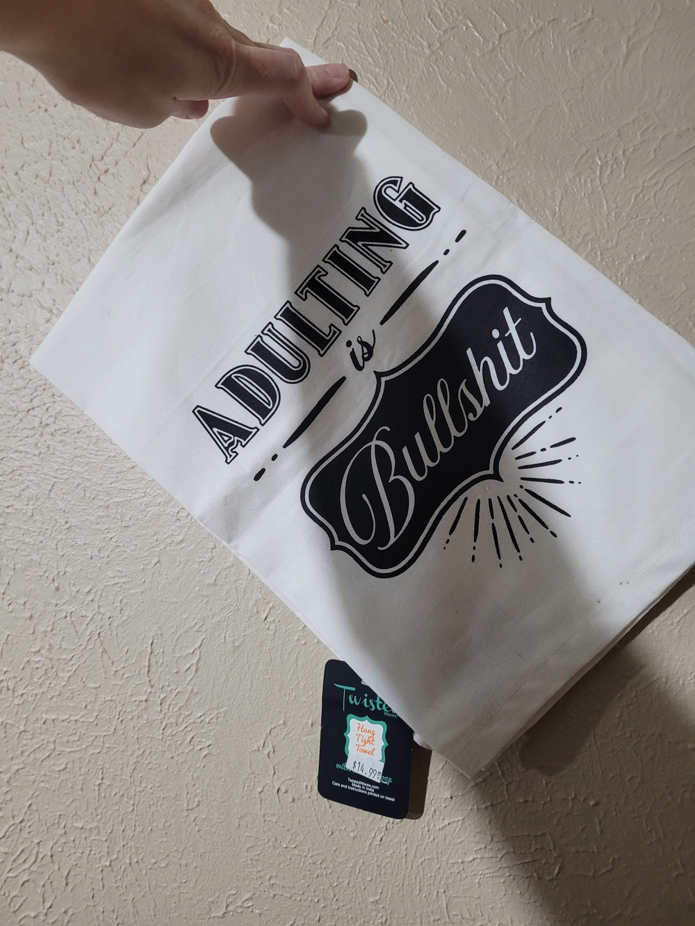 Twisted White Tea Towel with Black 'Adulting is Bullshit' Graphic